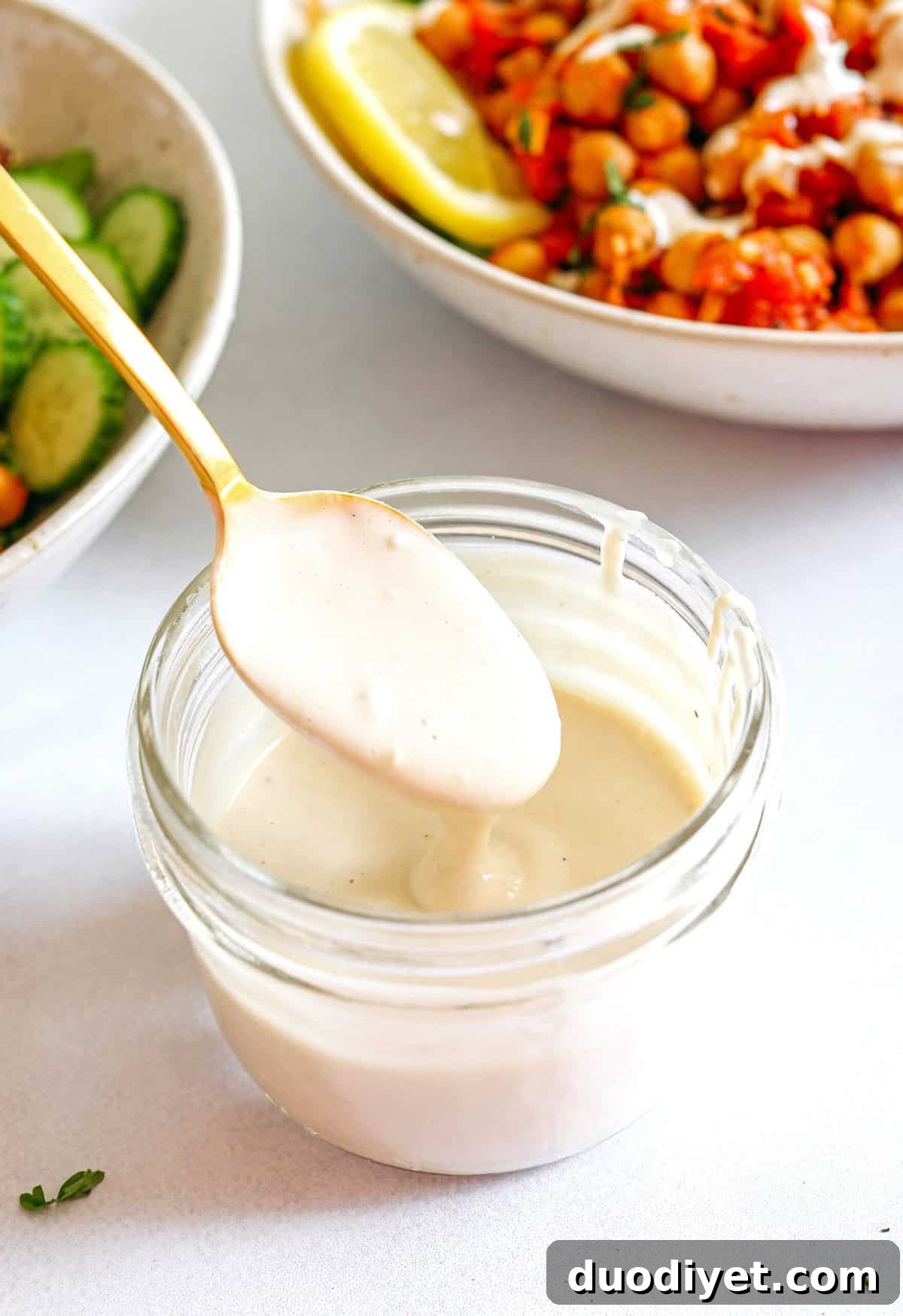 Protein-packed Spicy Chickpea Quinoa Bowls are loaded with flavor, perfect for meal prep and are easily made in just 20 minutes! Drizzle my lemony tahini dressing over top for even more flavor!