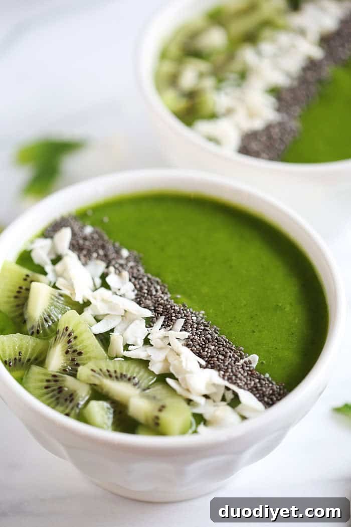 Tropical Green Smoothie Bowl Recipe with Mango and Spinach 2 Tropical Green Smoothie Bowl - eat-yourself-skinny.com