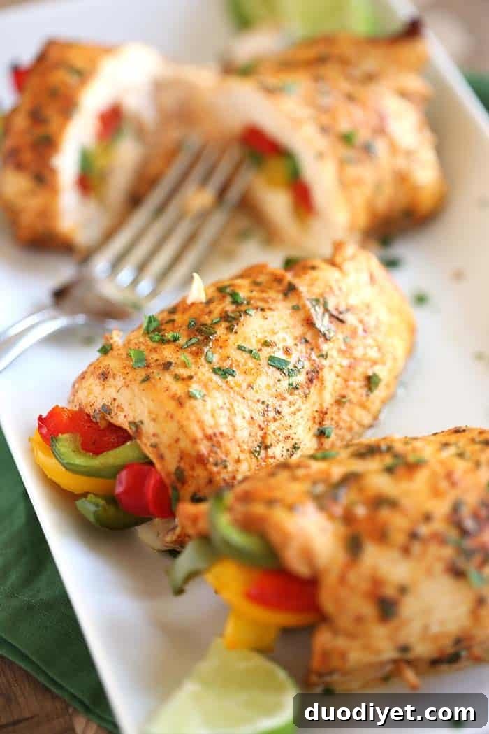 Oven-Baked Cheesy Chicken Fajita Roll-Ups 4 Freshly baked chicken fajita roll-ups with roasted peppers