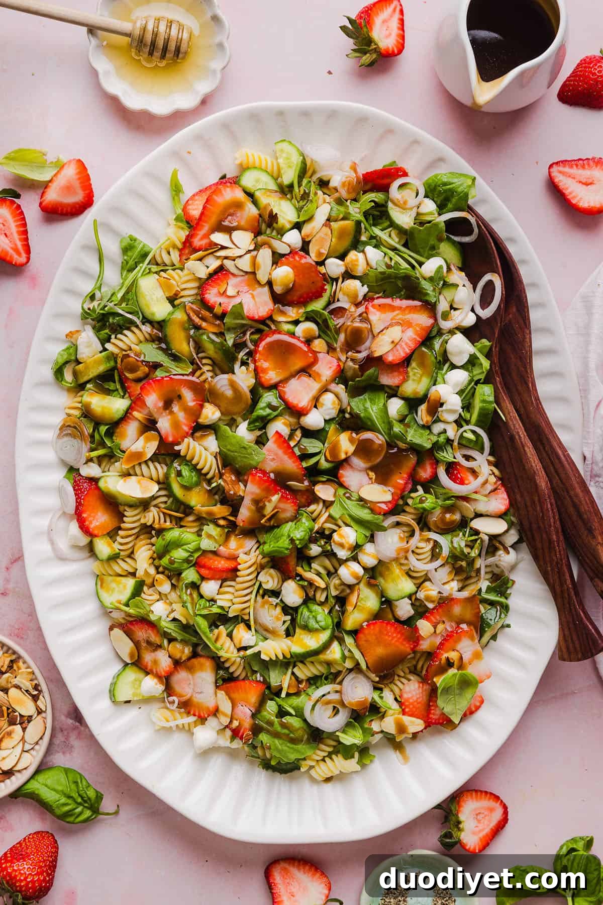This Strawberry Balsamic Pasta Salad is fresh, flavorful, and perfect for spring and summer! Made with juicy strawberries, tender pasta, fresh basil, creamy mozzarella and crisp cucumbers all tossed in a lightly sweet balsamic dressing.
