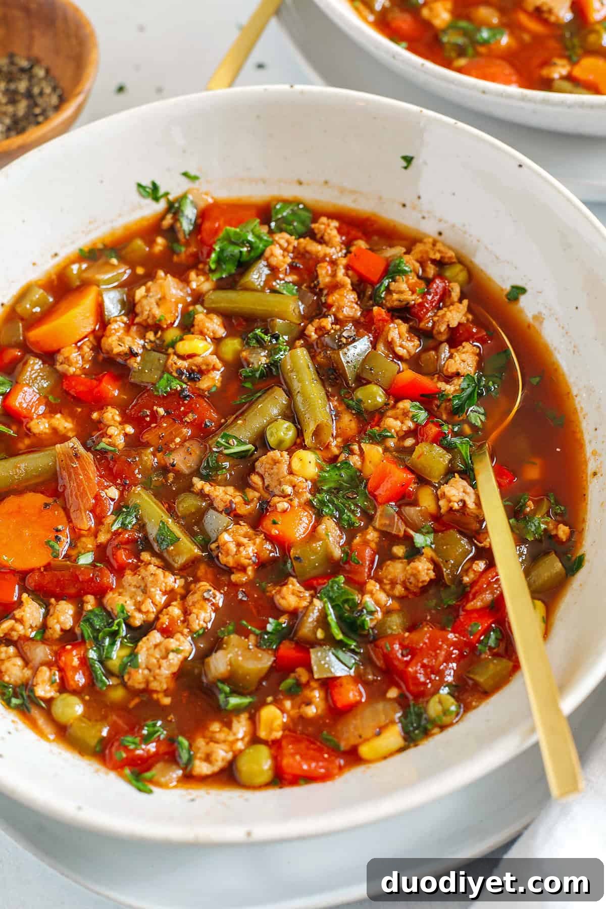 This One Pot Spicy Sausage Soup is hearty, loaded with a variety of vegetables and leafy kale, all simmered in flavorful beef broth, diced tomatoes and yes, a whole jar of salsa! 