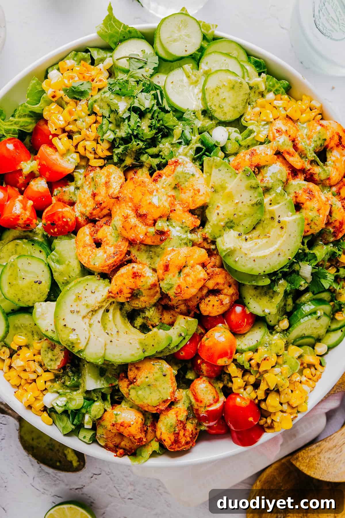 This Blackened Shrimp and Corn Salad is the perfect summer salad that is flavorful, filling and easily comes together in under 30 minutes! The cilantro lime dressing ties it all together with a bright, zesty finish!