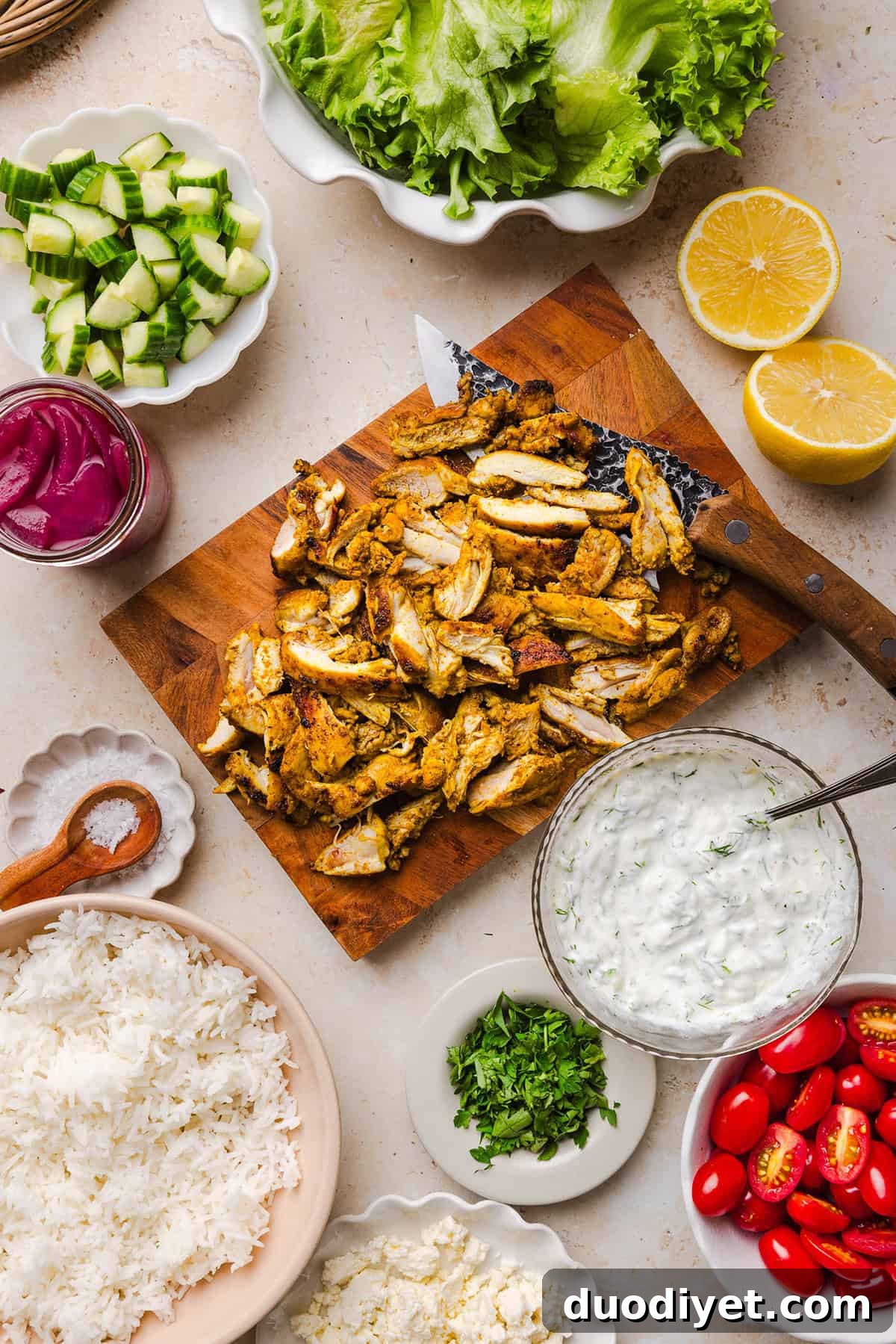These Easy Chicken Shawarma Bowls are loaded with juicy spiced chicken, fluffy rice, fresh veggies, feta and creamy homemade tzatziki! A healthy, flavor-packed meal that is great for meal prep!