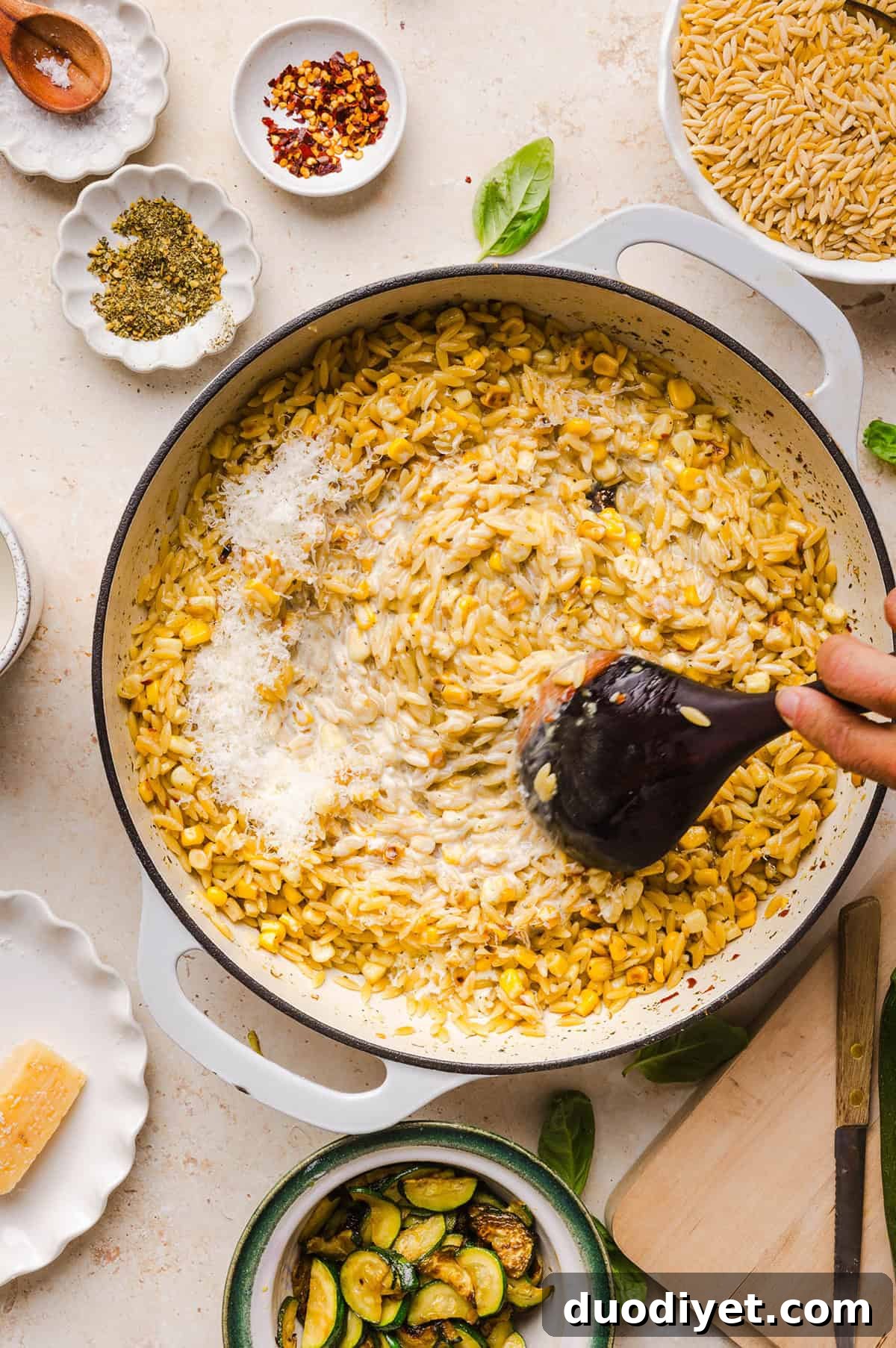 This creamy One Pan Lemon Garlic Orzo with Zucchini and Corn is fresh, flavorful and made in one skillet for an easy summer side dish or weeknight meal. Packed with fresh veggies, tender orzo, Parmesan, herbs and bright lemon flavor!